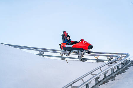 Snowtubing v lyžiarskom stredisku Bad Kleinkirchheim. 